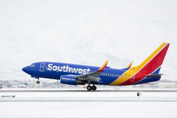 U.S. Government Sues Southwest Airlines, Fines Frontier